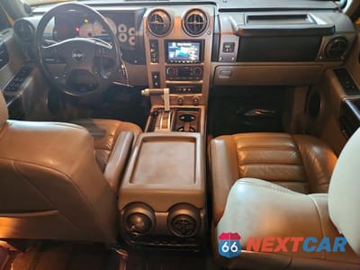 Zdjęcie 8 z 12 samochodu: 2004 HUMMER H2 VIN:5GRGN23U14H121832 - miniatura