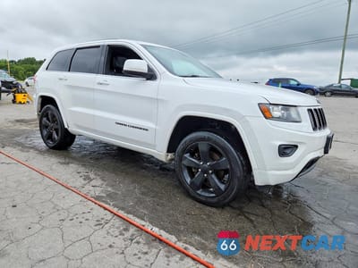 Czwarte zdjęcie samochodu z boku: 2014 JEEP GRAND CHEROKEE LAREDO VIN:1C4RJFAGXEC541405 - miniatura