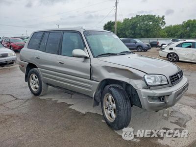 Czwarte zdjęcie samochodu z boku: 2000 TOYOTA RAV4 BASE VIN:JT3GP10V1Y7077270 - miniatura