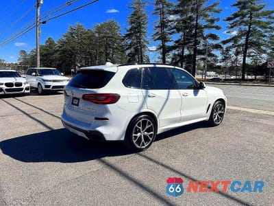 Czwarte zdjęcie samochodu z boku: 2021 BMW X5 XDRIVE45E VIN:5UXTA6C08M9D84086 - miniatura