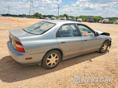 Trzecie zdjęcie samochodu z tyłu: 1994 HONDA ACCORD EX VIN:1HGCD5650RA154413 - miniatura