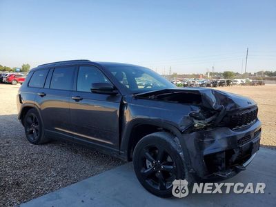 Czwarte zdjęcie samochodu z boku: 2023 JEEP GRAND CHEROKEE L LAREDO VIN:1C4RJKAGXP8872953 - miniatura