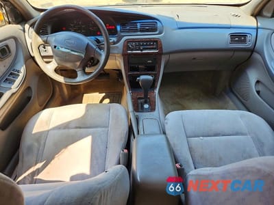 Zdjęcie 8 z 12 samochodu: 1999 NISSAN ALTIMA XE VIN:1N4DL01DXXC268983 - miniatura