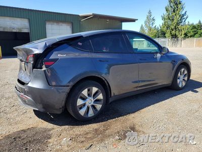 Trzecie zdjęcie samochodu z tyłu: 2023 TESLA MODEL Y VIN:7SAYGDEEXPF607774 - miniatura