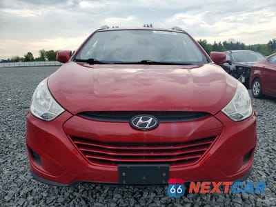 Piąte zdjęcie samochodu w środku: 2010 HYUNDAI TUCSON GLS VIN:KM8JUCAC6AU021685 - miniatura