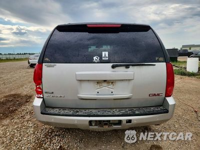 Zdjęcie 6 z 13 samochodu: 2011 GMC YUKON SLT VIN:1GKS2CE0XBR346606 - miniatura