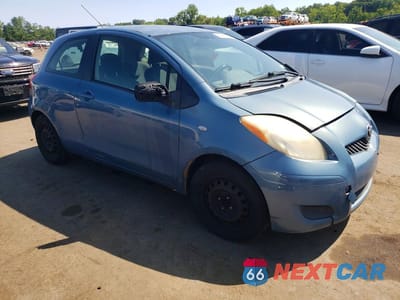 Czwarte zdjęcie samochodu z boku: 2009 TOYOTA YARIS BASE VIN:JTDJT903595230059 - miniatura