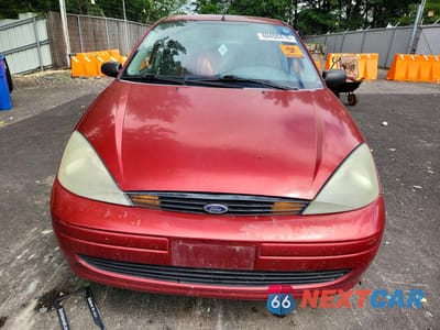 Piąte zdjęcie samochodu w środku: 2003 FORD FOCUS LX VIN:1FAFP33Z83W302984 - miniatura
