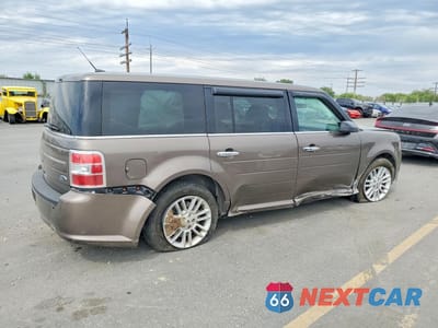 Trzecie zdjęcie samochodu z tyłu: 2019 FORD FLEX SEL VIN:2FMGK5C82KBA32243 - miniatura