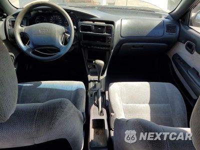 Zdjęcie 8 z 12 samochodu: 1995 TOYOTA COROLLA DX VIN:JT2AE09B8S0100661 - miniatura