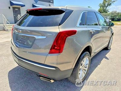 Trzecie zdjęcie samochodu z tyłu: 2017 CADILLAC XT5 VIN:1GYKNARS2HZ240947 - miniatura
