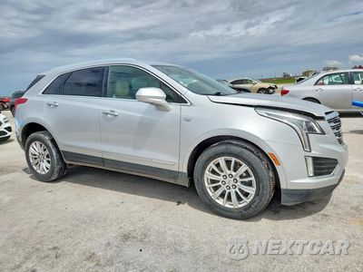 Czwarte zdjęcie samochodu z boku: 2019 CADILLAC XT5 VIN:1GYKNARS9KZ105309 - miniatura