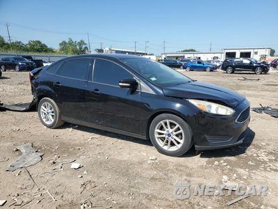 Czwarte zdjęcie samochodu z boku: 2017 FORD FOCUS SE VIN:1FADP3F25HL291764 - miniatura