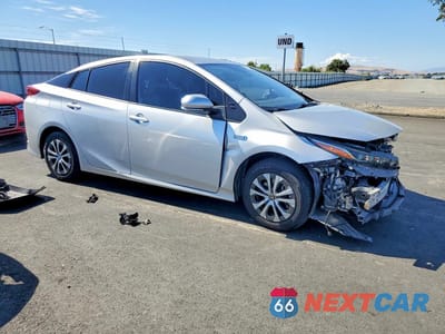 Czwarte zdjęcie samochodu z boku: 2021 TOYOTA PRIUS PRIME LIMITED VIN:JTDKAMFP3M3172089 - miniatura