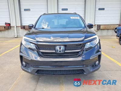 Piąte zdjęcie samochodu w środku: 2021 HONDA PILOT SE VIN:5FNYF5H20MB022141 - miniatura