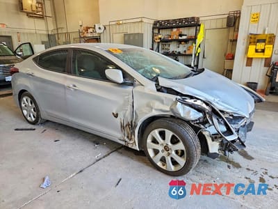 Czwarte zdjęcie samochodu z boku: 2014 HYUNDAI ELANTRA SE VIN:5NPDH4AE4EH464317 - miniatura