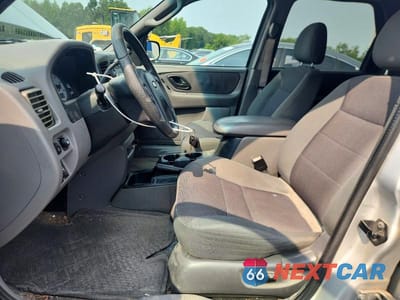 Zdjęcie 7 z 13 samochodu: 2002 FORD ESCAPE XLT VIN:1FMYU03172KB24488 - miniatura