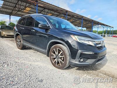 Czwarte zdjęcie samochodu z boku: 2020 HONDA PILOT TOURING VIN:5FNYF6H60LB038380 - miniatura
