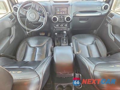 Zdjęcie 8 z 14 samochodu: 2015 JEEP WRANGLER UNLIMITED SAHARA VIN:1C4BJWEG0FL563913 - miniatura