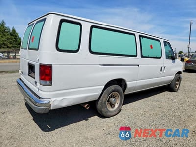 Trzecie zdjęcie samochodu z tyłu: 2000 FORD ECONOLINE E350 SUPER DUTY WAGON VIN:1FBSS31L5YHB48210 - miniatura