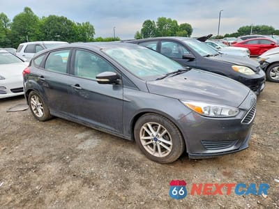Czwarte zdjęcie samochodu z boku: 2016 FORD FOCUS SE VIN:1FADP3K20GL292101 - miniatura