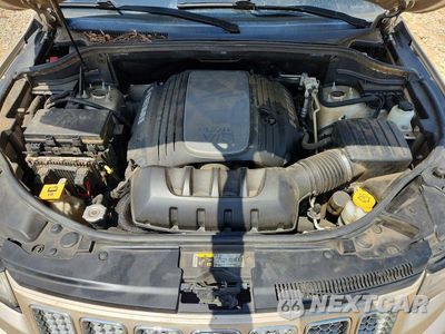 Zdjęcie 12 z 13 samochodu: 2014 JEEP GRAND CHEROKEE SUMMIT VIN:1C4RJEJT2EC359592 - miniatura