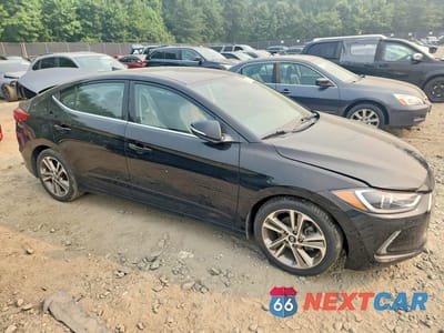 Czwarte zdjęcie samochodu z boku: 2018 HYUNDAI ELANTRA LIMITED VIN:5NPD84LF6JH272221 - miniatura