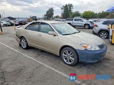 Czwarte zdjęcie samochodu z boku: 2004 TOYOTA CAMRY LE VIN:4T1BE32K64U863731 - miniatura