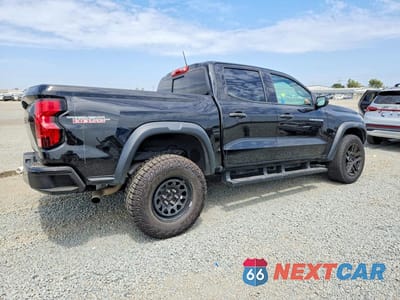 Trzecie zdjęcie samochodu z tyłu: 2023 CHEVROLET COLORADO TRAIL BOSS VIN:1GCPTEEK6P1133170 - miniatura