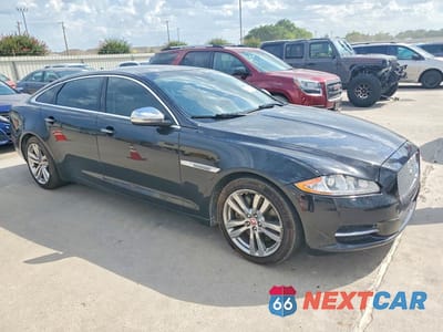 Czwarte zdjęcie samochodu z boku: 2015 JAGUAR XJL PORTFOLIO VIN:SAJWA2GZ3F8V80671 - miniatura