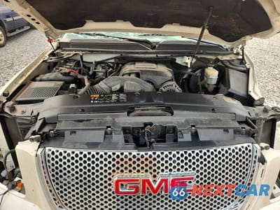 Zdjęcie 11 z 13 samochodu: 2012 GMC YUKON XL DENALI VIN:1GKS2MEF9CR130807 - miniatura