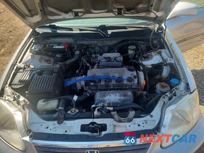 Zdjęcie 11 z 12 samochodu: 1999 HONDA CIVIC EX VIN:1HGEJ8647XL022020 - miniatura