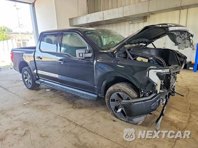Czwarte zdjęcie samochodu z boku: 2024 FORD F150 LIGHTNING XLT VIN:1FTVW3LK4RWG06236 - miniatura