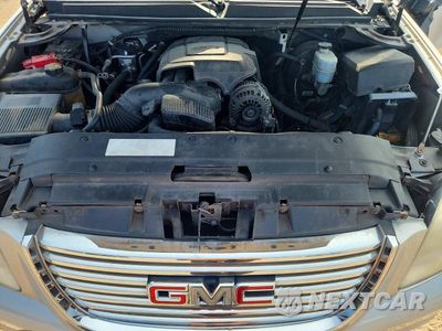 Zdjęcie 11 z 12 samochodu: 2011 GMC YUKON SLE VIN:1GKS2AE00BR200932 - miniatura