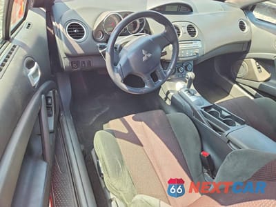 Zdjęcie 8 z 12 samochodu: 2009 MITSUBISHI ECLIPSE SPYDER GS VIN:4A3AL25F29E039948 - miniatura