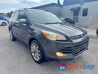 Czwarte zdjęcie samochodu z boku: 2016 FORD ESCAPE SE VIN:1FMCU0GX4GUC35892 - miniatura