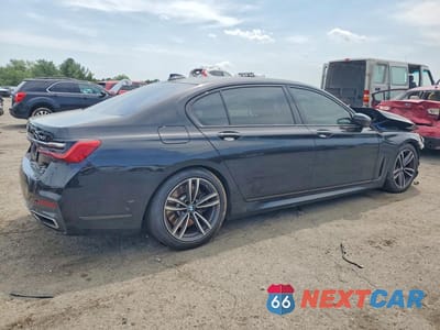 Trzecie zdjęcie samochodu z tyłu: 2022 BMW 750 XI VIN:WBA7U2C02NCJ34070 - miniatura