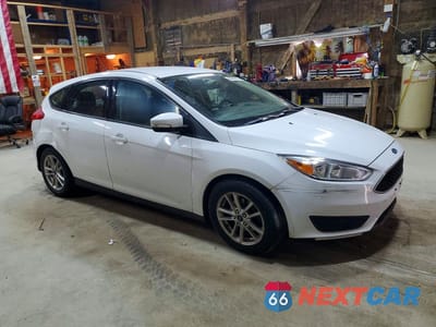 Czwarte zdjęcie samochodu z boku: 2016 FORD FOCUS SE VIN:1FADP3K27GL217394 - miniatura