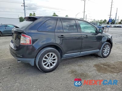 Trzecie zdjęcie samochodu z tyłu: 2010 FORD EDGE SEL VIN:2FMDK3JC8ABA72632 - miniatura
