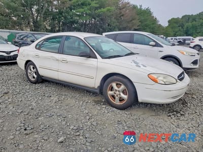 Czwarte zdjęcie samochodu z boku: 2003 FORD TAURUS SES VIN:1FAFP55213G229642 - miniatura