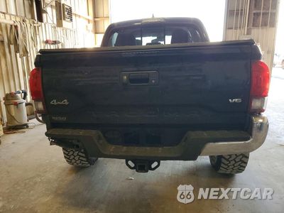 Zdjęcie 6 z 13 samochodu: 2019 TOYOTA TACOMA SR5 V6 VIN:3TMCZ5AN7KM253469 - miniatura