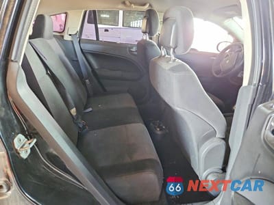 Zdjęcie 11 z 13 samochodu: 2010 DODGE CALIBER MAINSTREET VIN:1B3CB3HA1AD581798 - miniatura