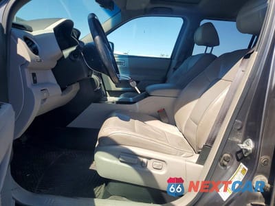 Zdjęcie 7 z 12 samochodu: 2012 HONDA PILOT EXL VIN:5FNYF4H5XCB060835 - miniatura