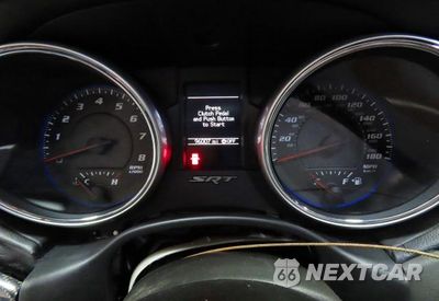 Zdjęcie 8 z 10 samochodu: 2013 JEEP GRAND CHEROKEE SRT-8 VIN:1C4RJFDJ4DC563714 - miniatura