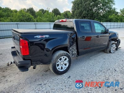 Trzecie zdjęcie samochodu z tyłu: 2021 CHEVROLET COLORADO LT VIN:1GCGTCEN9M1106040 - miniatura