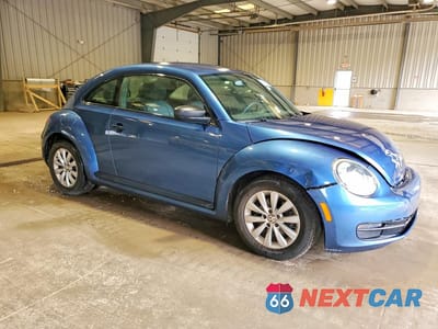 Czwarte zdjęcie samochodu z boku: 2016 VOLKSWAGEN BEETLE 1.8T VIN:3VWF17AT3GM606180 - miniatura