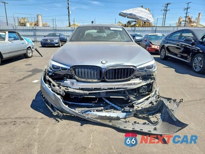 Piąte zdjęcie samochodu w środku: 2018 BMW 530E VIN:WBAJA9C57JG622906 - miniatura