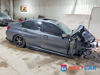 Czwarte zdjęcie samochodu z boku: 2019 BMW 330XI VIN:WBA5R7C53KAE82553 - miniatura