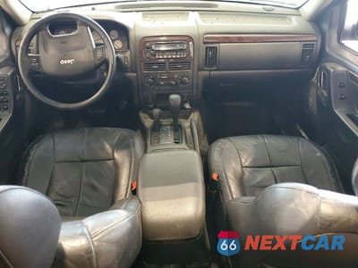 Zdjęcie 8 z 13 samochodu: 2003 JEEP GRAND CHEROKEE LIMITED VIN:1J4GW58N83C546746 - miniatura