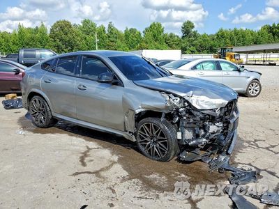 Czwarte zdjęcie samochodu z boku: 2022 BMW X6 M VIN:5YMCY0C05N9N43128 - miniatura